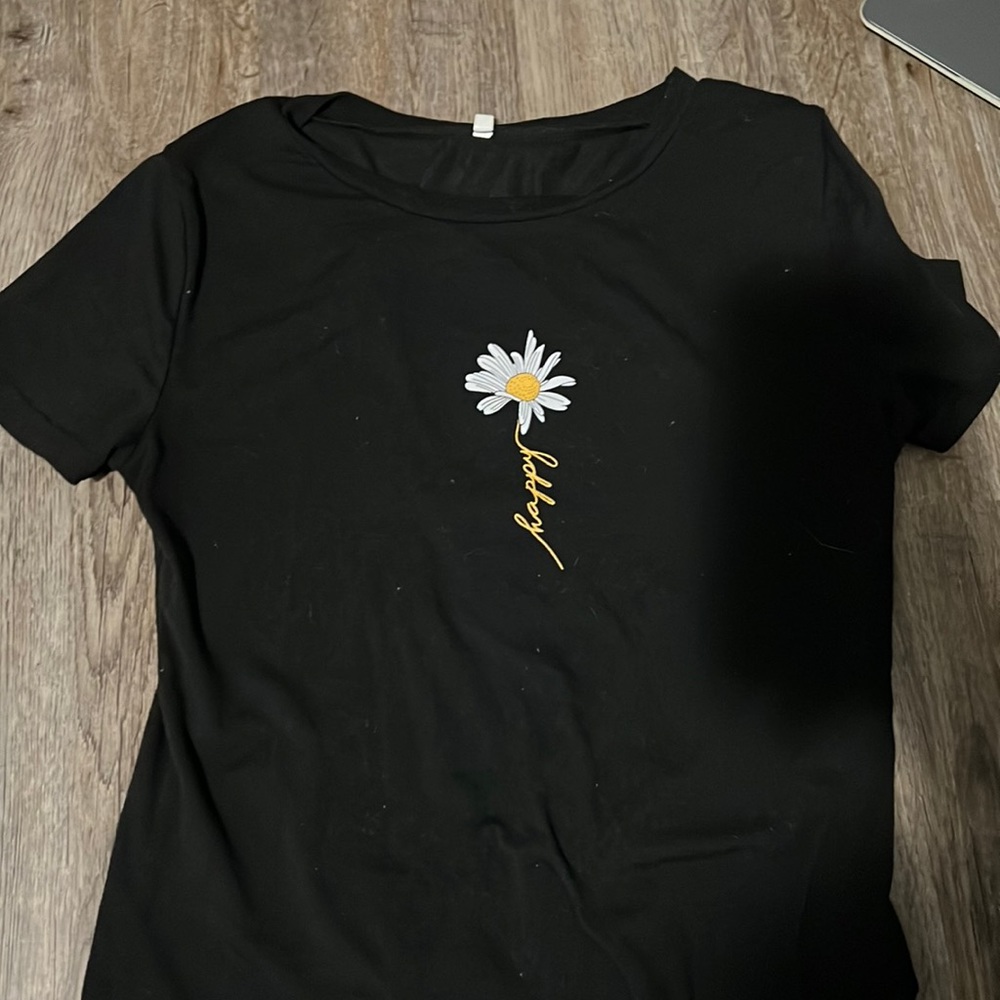 Black tee shirt with sunflower design